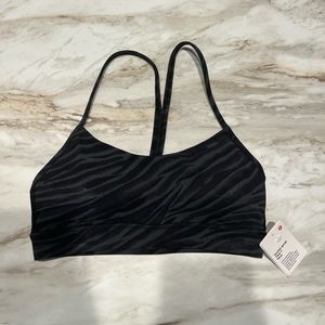 Lululemon flow Y bra Hulu black zebra size 4